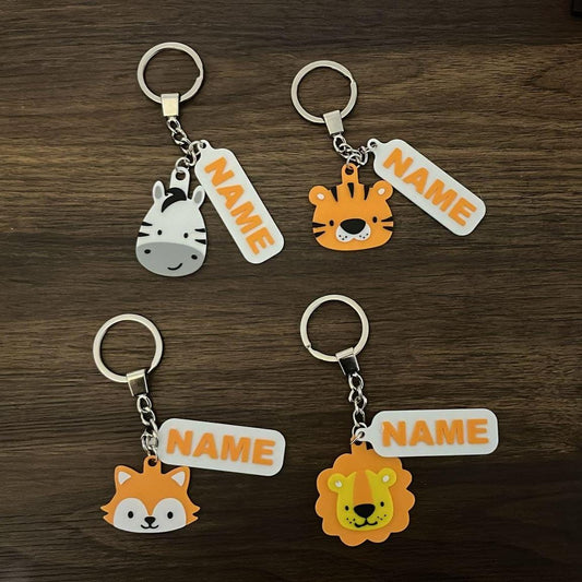 animal-themed keychains with 'NAME' tags 